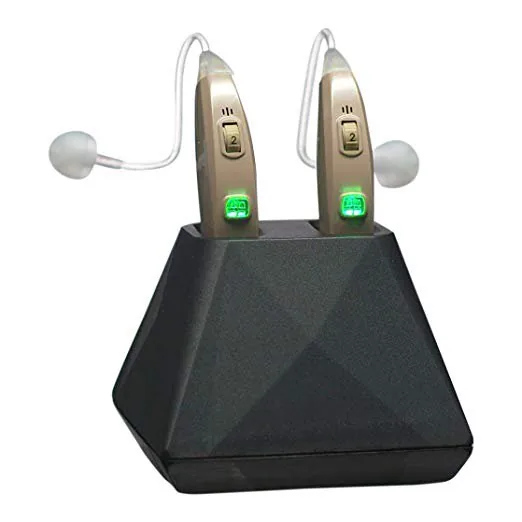 Gold behind-the-ear hearing aids in geometric charging dock