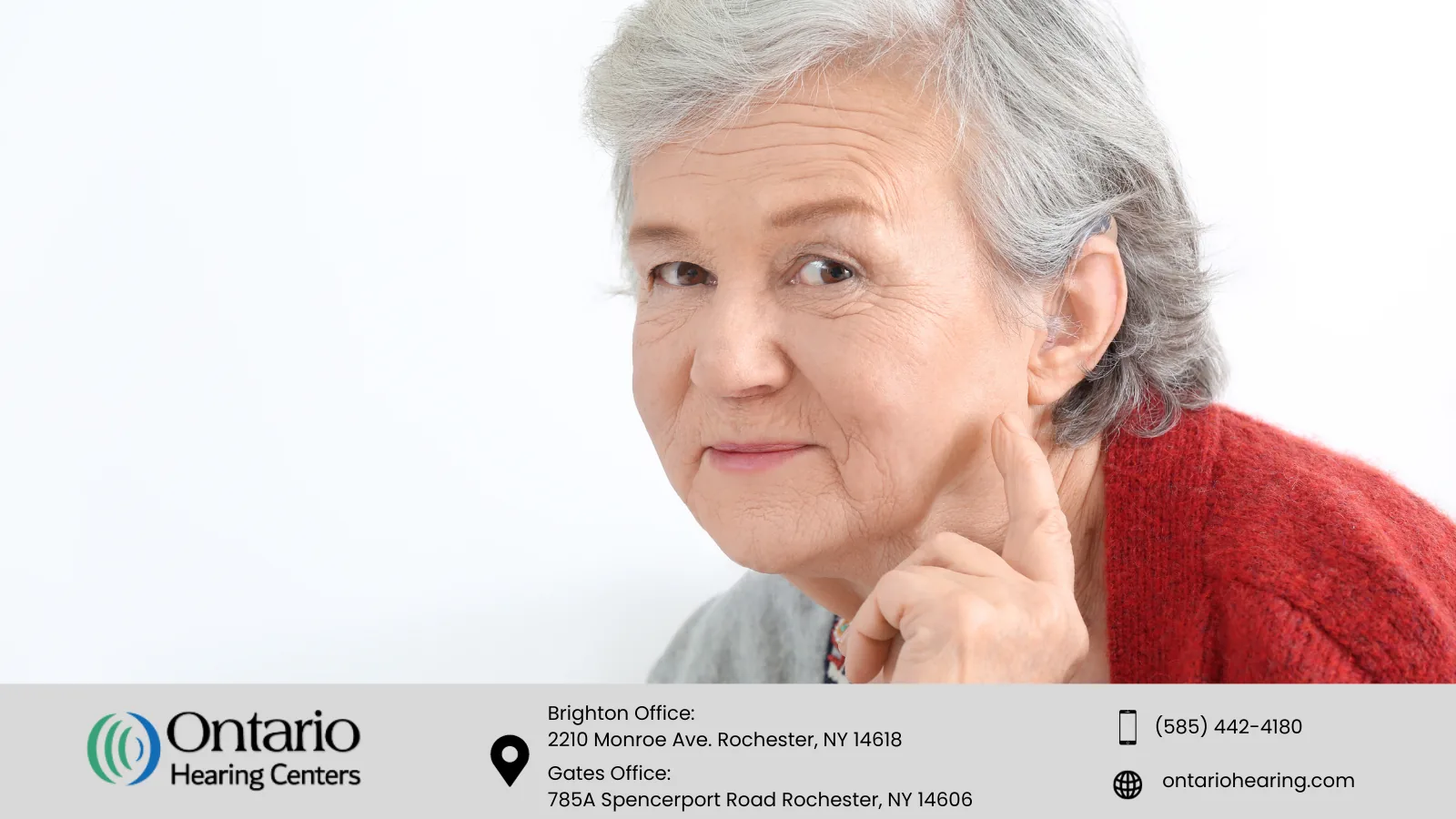 Elderly woman with hearing aid