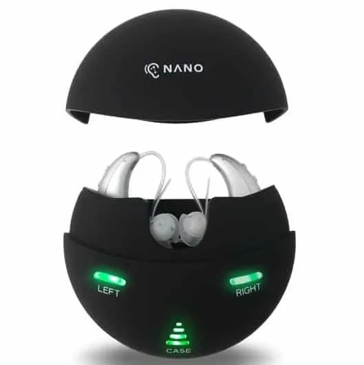 Nano silver hearing aids in black charging case with LED indicators