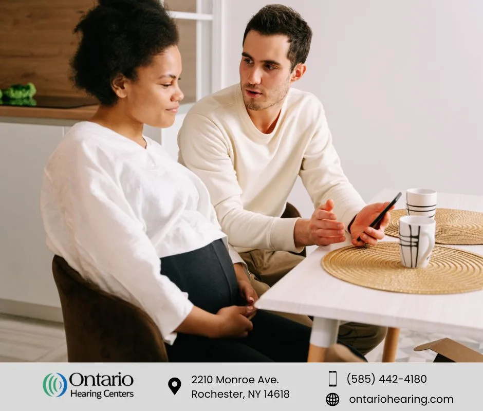 Couple sitting at a table, representing a speech audiometry discussion